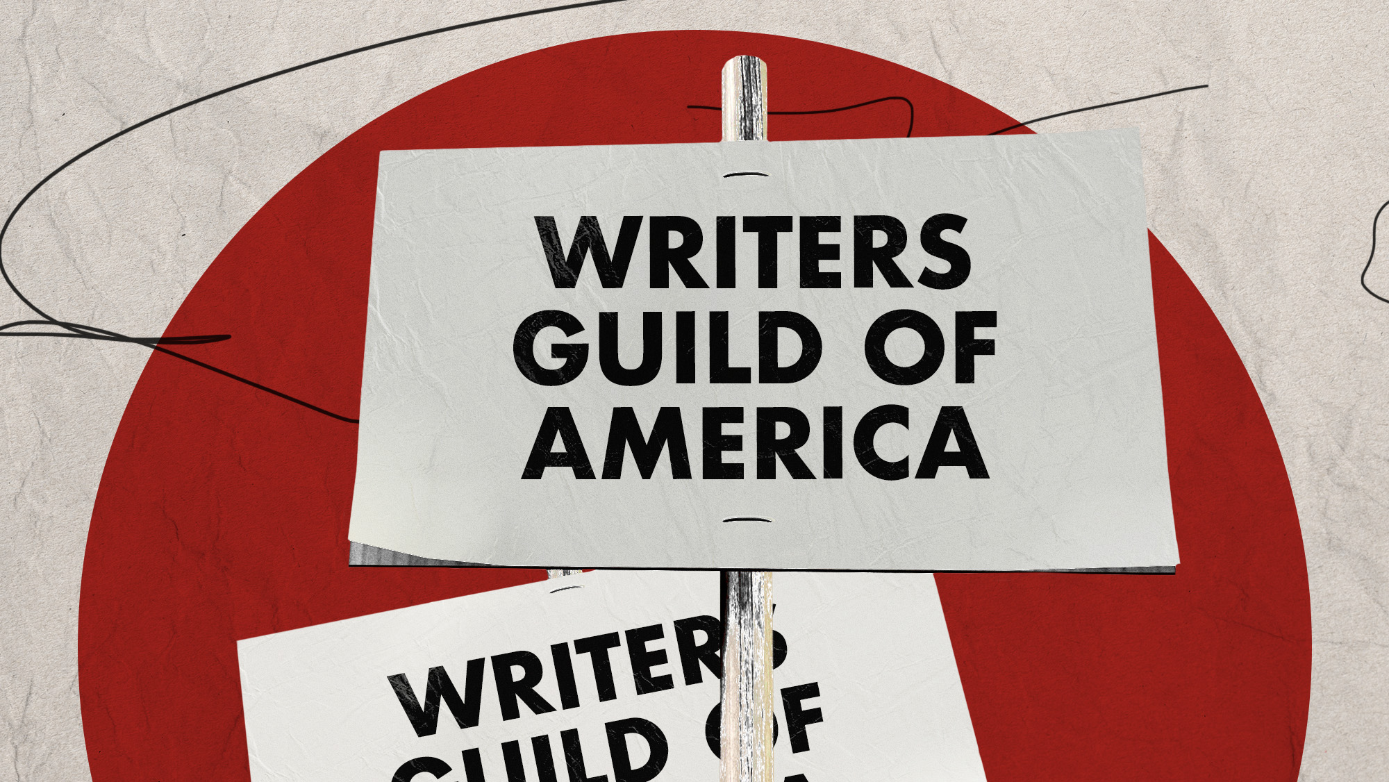 Two picket signs with Writers Guild of America written on them